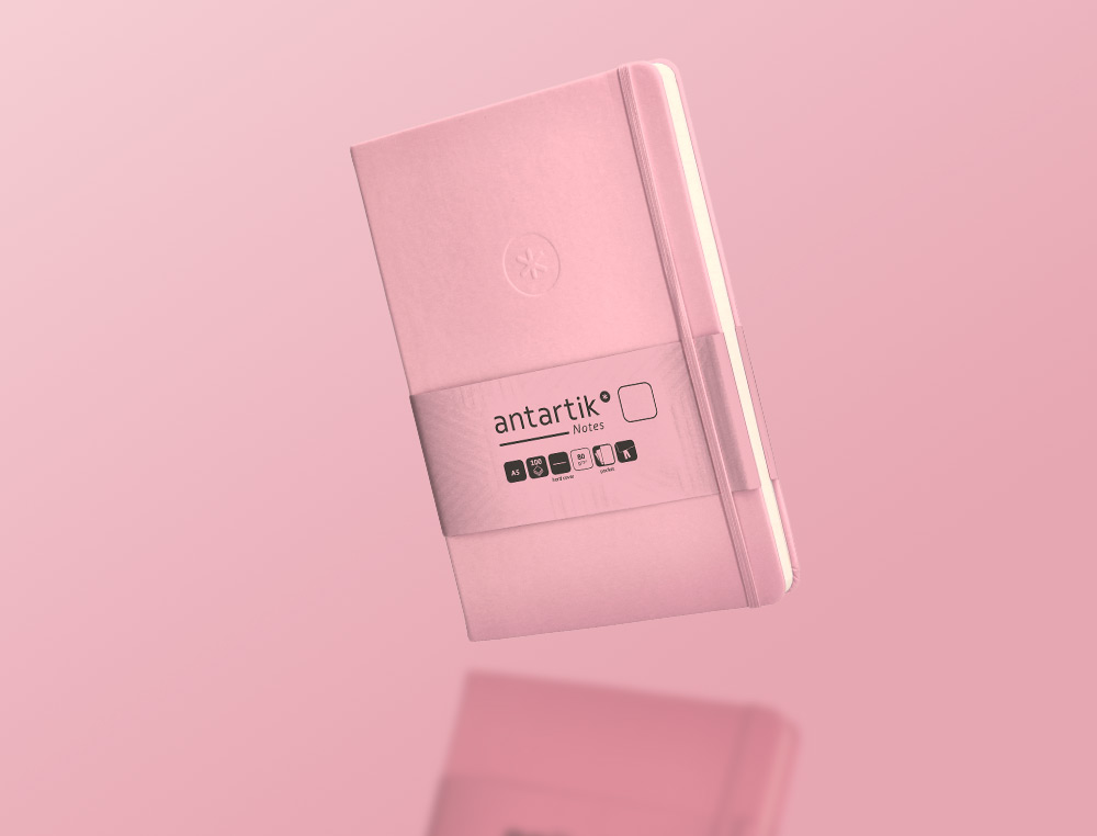 CARNET A5 ANTARTIK NOTES PAPIER UNI IVOIRE COUVERTURE RIGIDE FERMETURE ELASTIQUE 200PAGES 80GR COLORIS ROSE PASTEL