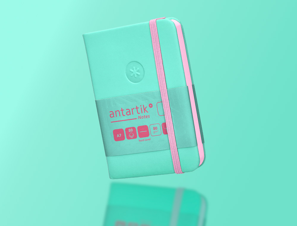 CARNET A7 ANTARTIK NOTES PAPIER UNI IVOIRE COUVERTURE RIGIDE FERMETURE ELASTIQUE ROSE 80 PAGES 80GR COLORIS TURQUOISE